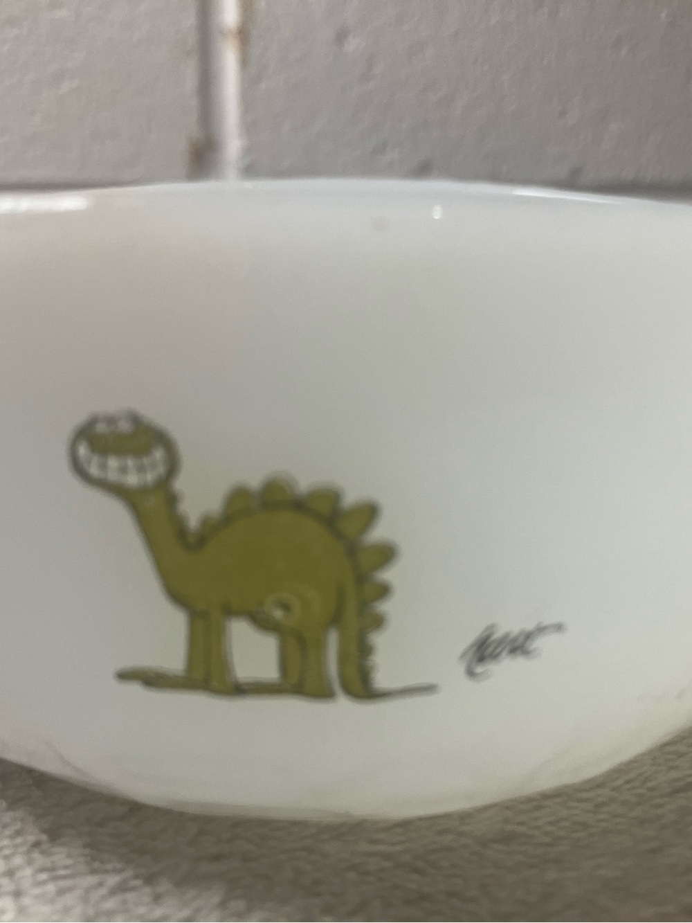 White Ceramic Bowl with Green Dino Illustration